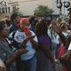 A woman talks to a Chicago police officer during a protest